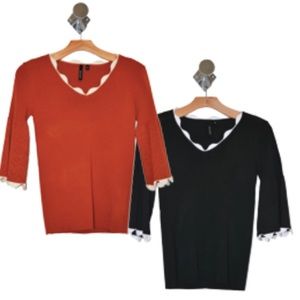 Scalloped knitted eyelet bell sleeve sweater.